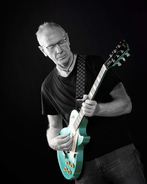 Electric guitar performer