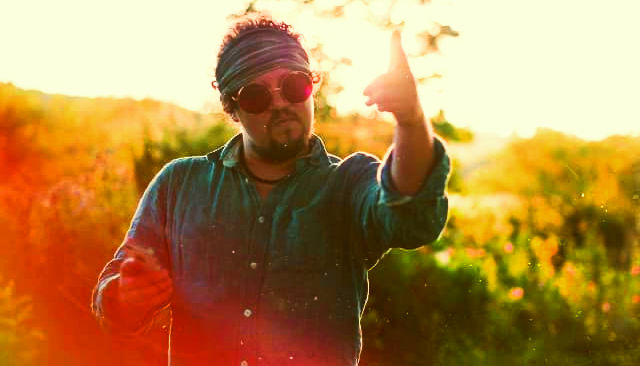 Performer outdoors in colourful sunlight